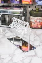 Cintre porte boucles d'oreilles effet miroir